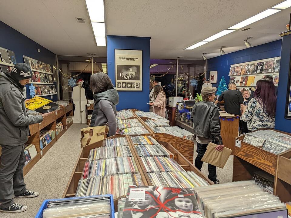 Customers Browsing Vinyl Records at Modern Sounds in Boise